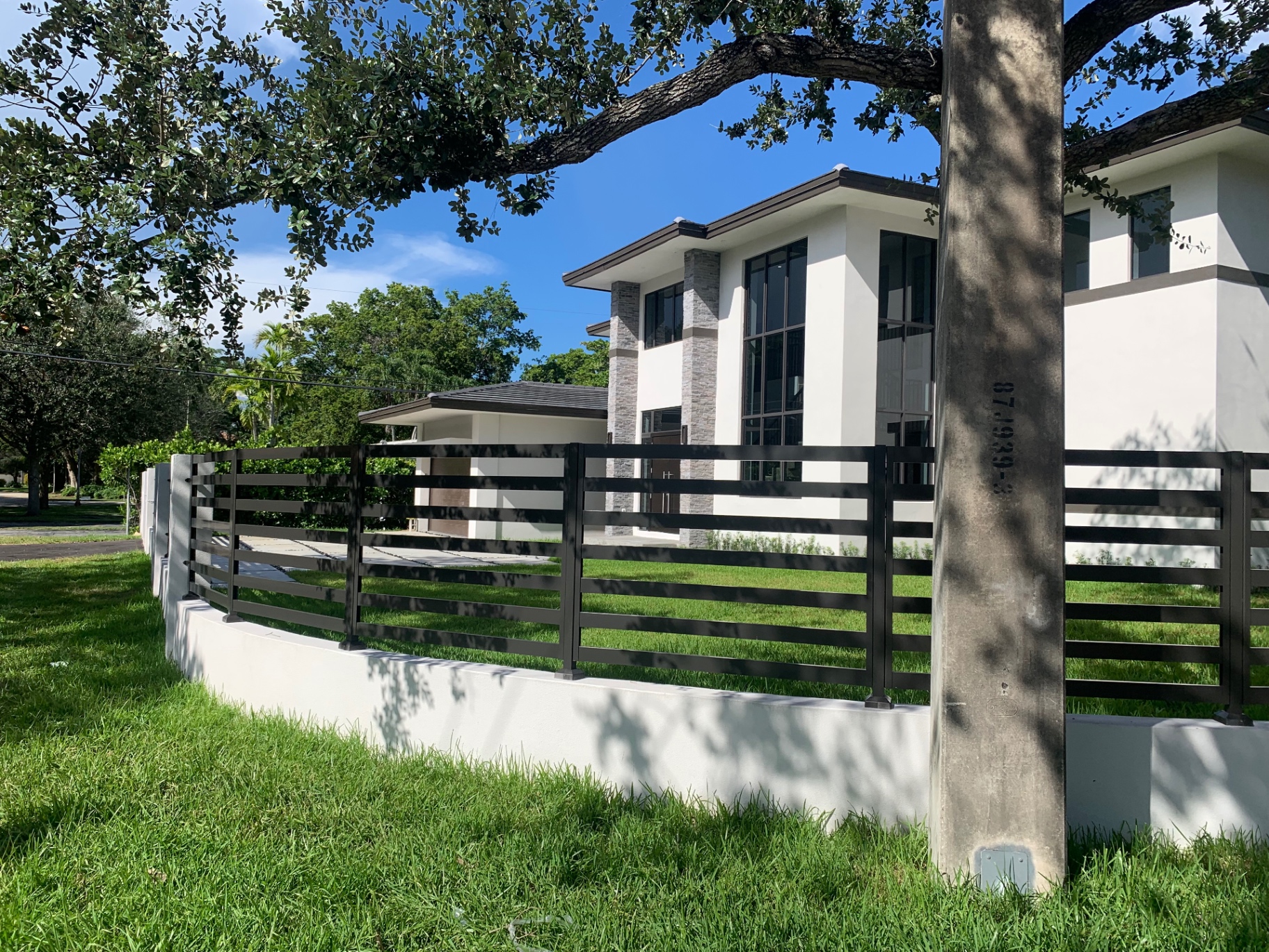 Wall-Mounted Black Yard Fence