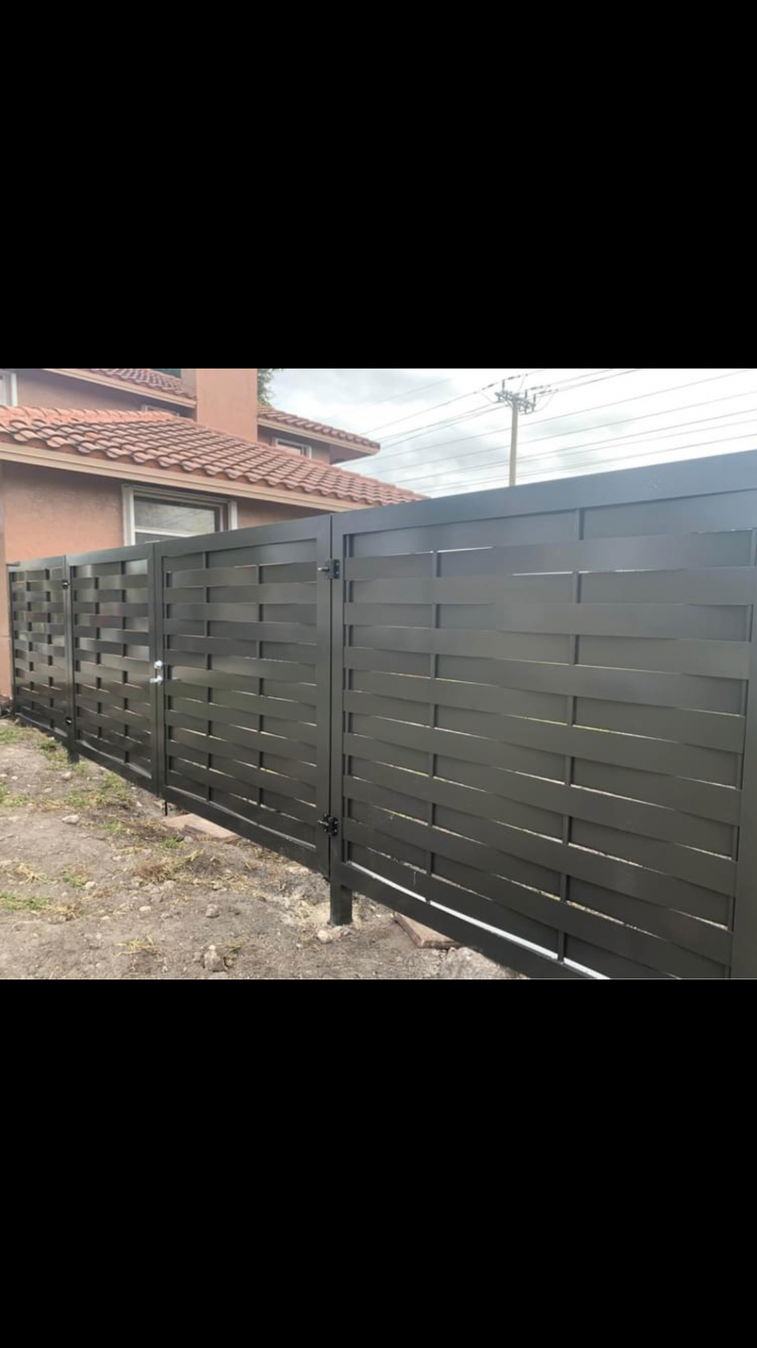 Black Woven Aluminum Fence